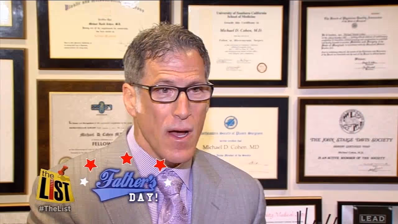 A logo featuring the text 'The List' with the hashtag '#TheList' and three red stars above the words 'Father's Day.' A man in a suit and glasses is speaking in front of framed certificates and awards on the wall.