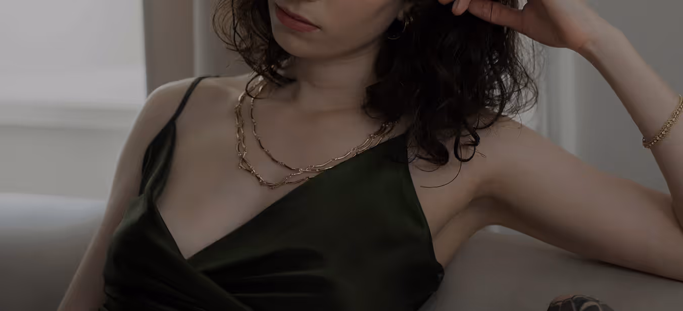 Woman in soft light looking over her shoulder