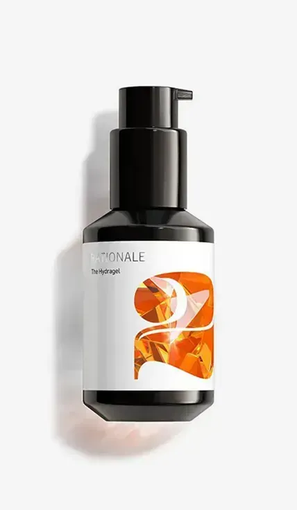 A bottle of liquid on a white background