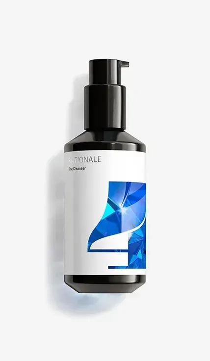 A bottle of liquid on a white background